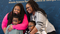 parents and two children at the Georgia Tech Atlanta Science Festival launch